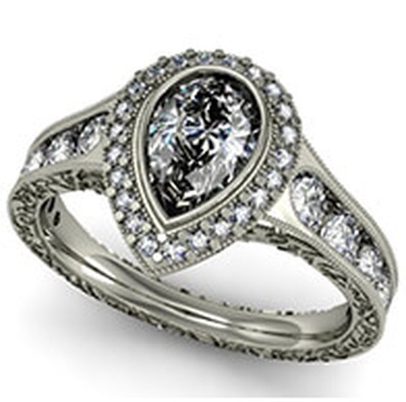 A pear-shaped halo engagement ring
